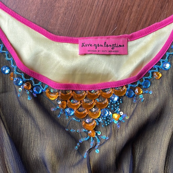 Beaded sleeveless top with back tie and black sheer overlay - Picture 3 of 3